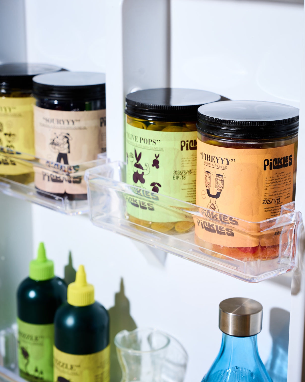 Pickles Dip & Drip Set products arranged inside a refrigerator